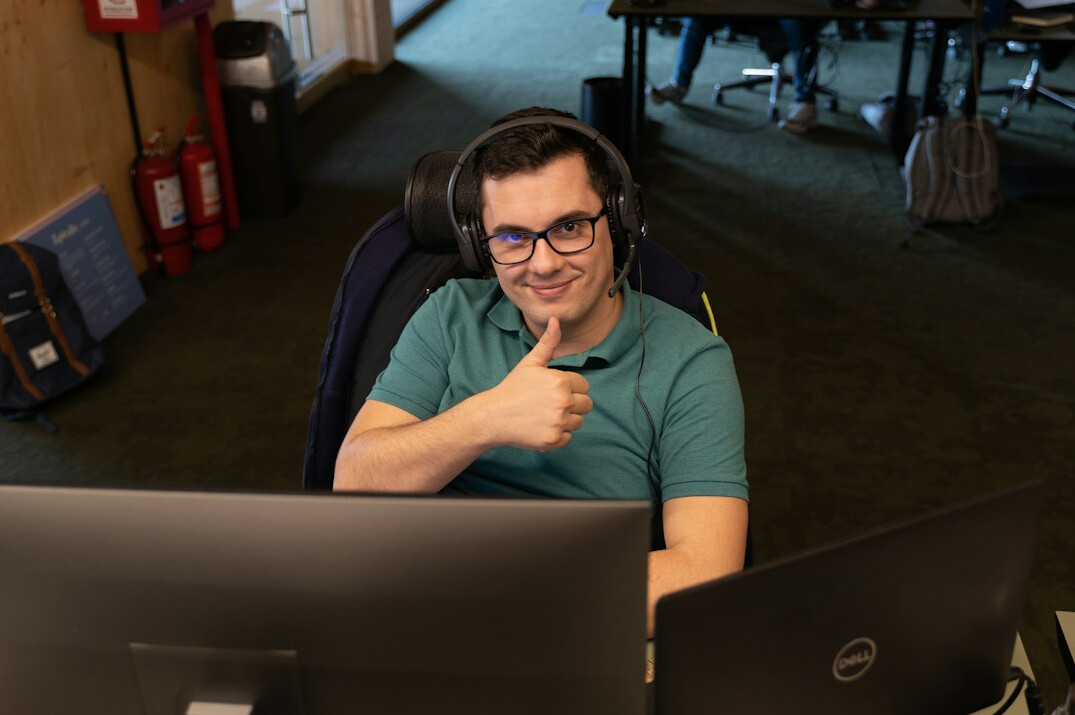successful programmer smiling