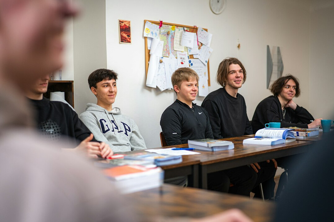 students learning programming in classroom